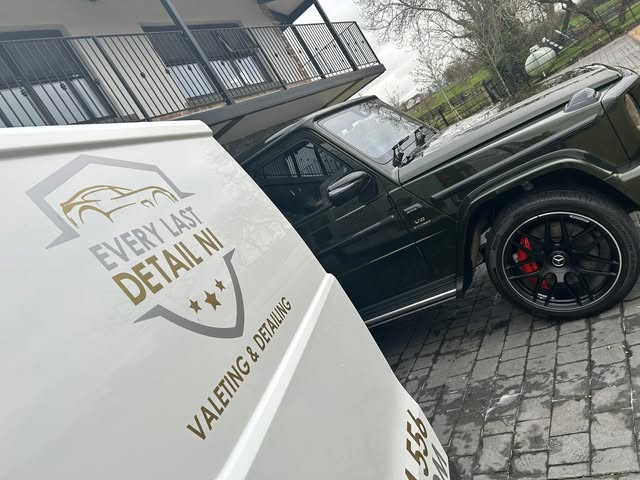 Every Last Detail NI branding on a white panel beside a dark SUV on a paved drive.